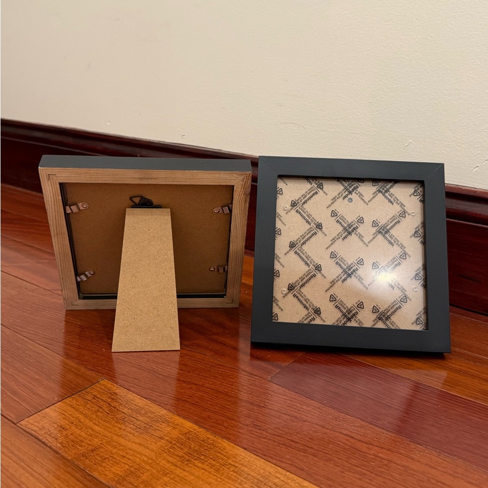 7x7 picture frame with approx. 5.5” opening; classic, simple black photo frame